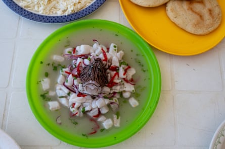 Ceviche dish in a green bowl